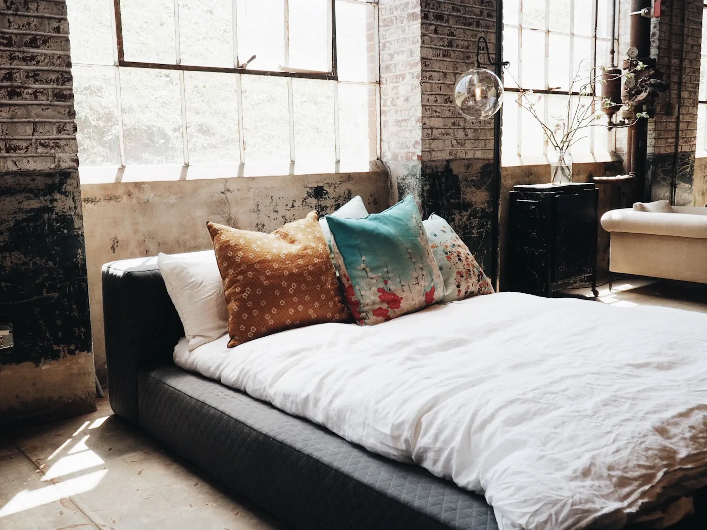 Bed with white bedding and pillows