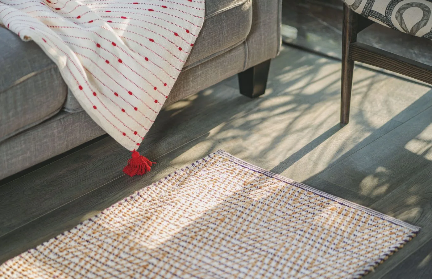 Textured rug beside a sofa